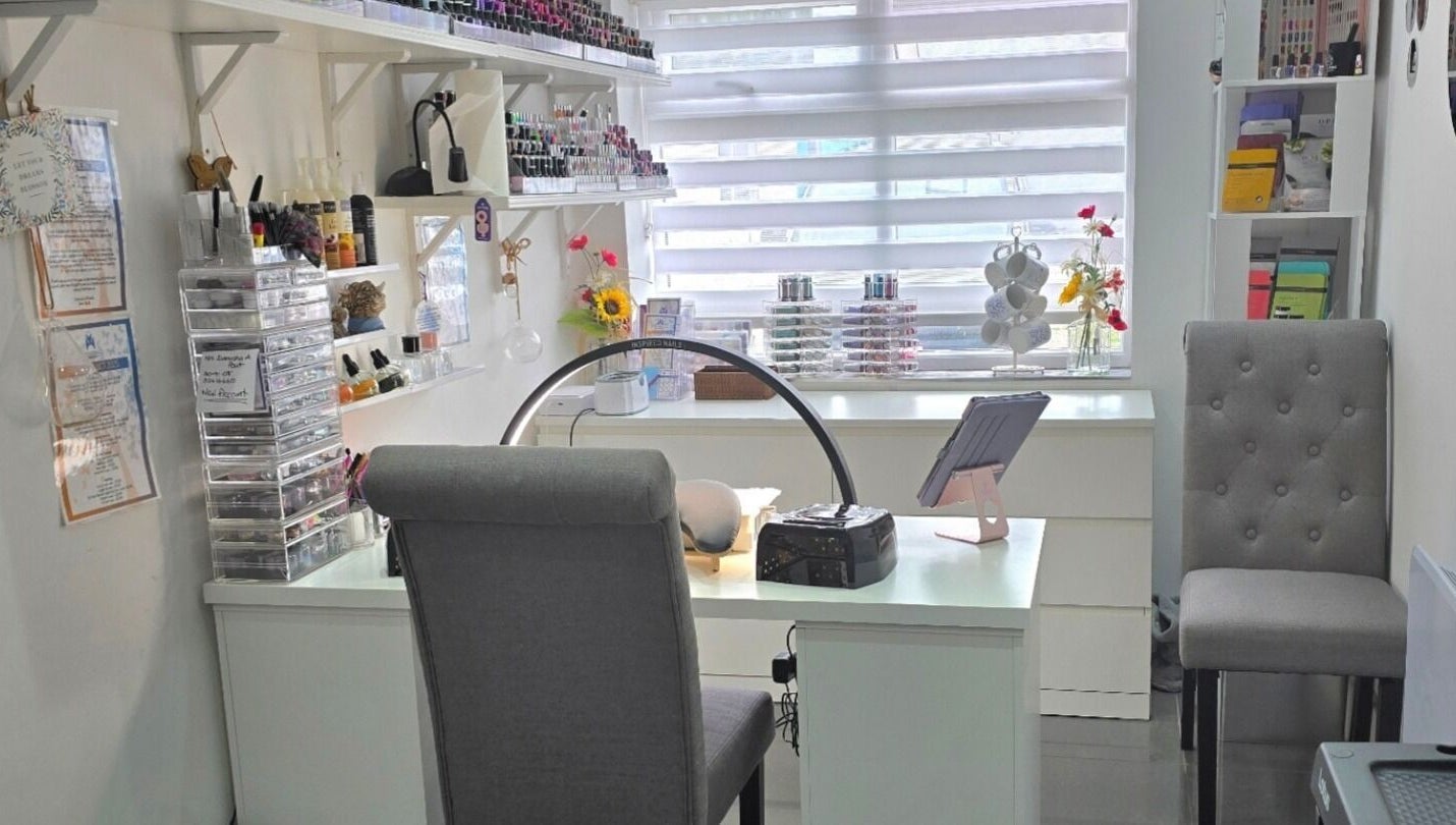 Inspired Nails studio interior showcasing nail polish displays in Northbourne, England, GB.