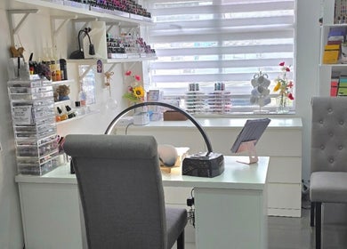 Inspired Nails studio interior showcasing nail polish displays in Northbourne, England, GB.