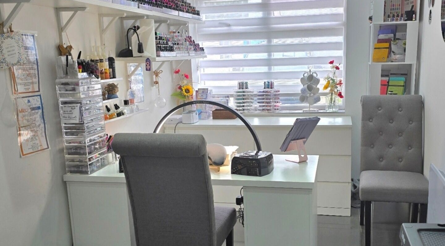 Inspired Nails studio interior showcasing nail polish displays in Northbourne, England, GB.