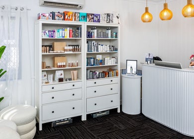 Reception area at Plush Skin Body and Beauty in East Toowoomba, Queensland, AU, featuring elegant product displays.