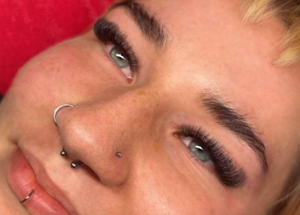 Close-up of expertly applied eyelash extensions at Wild Honey Lash Co, Calgary, Alberta, CA.