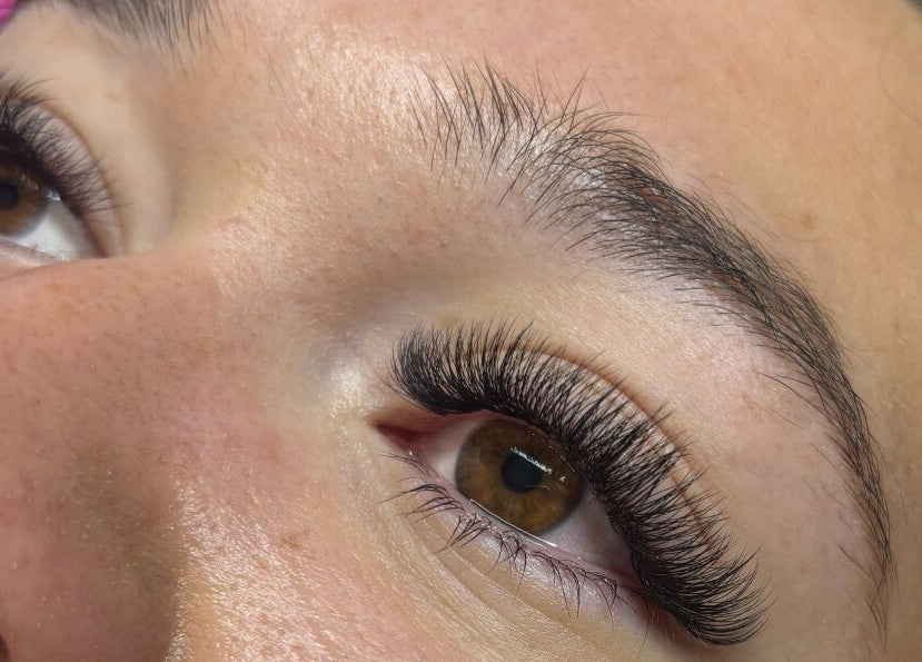 Close-up of eyelash extensions at Wild Honey Lash Co in Calgary, Alberta, CA, showcasing detailed lash artistry.