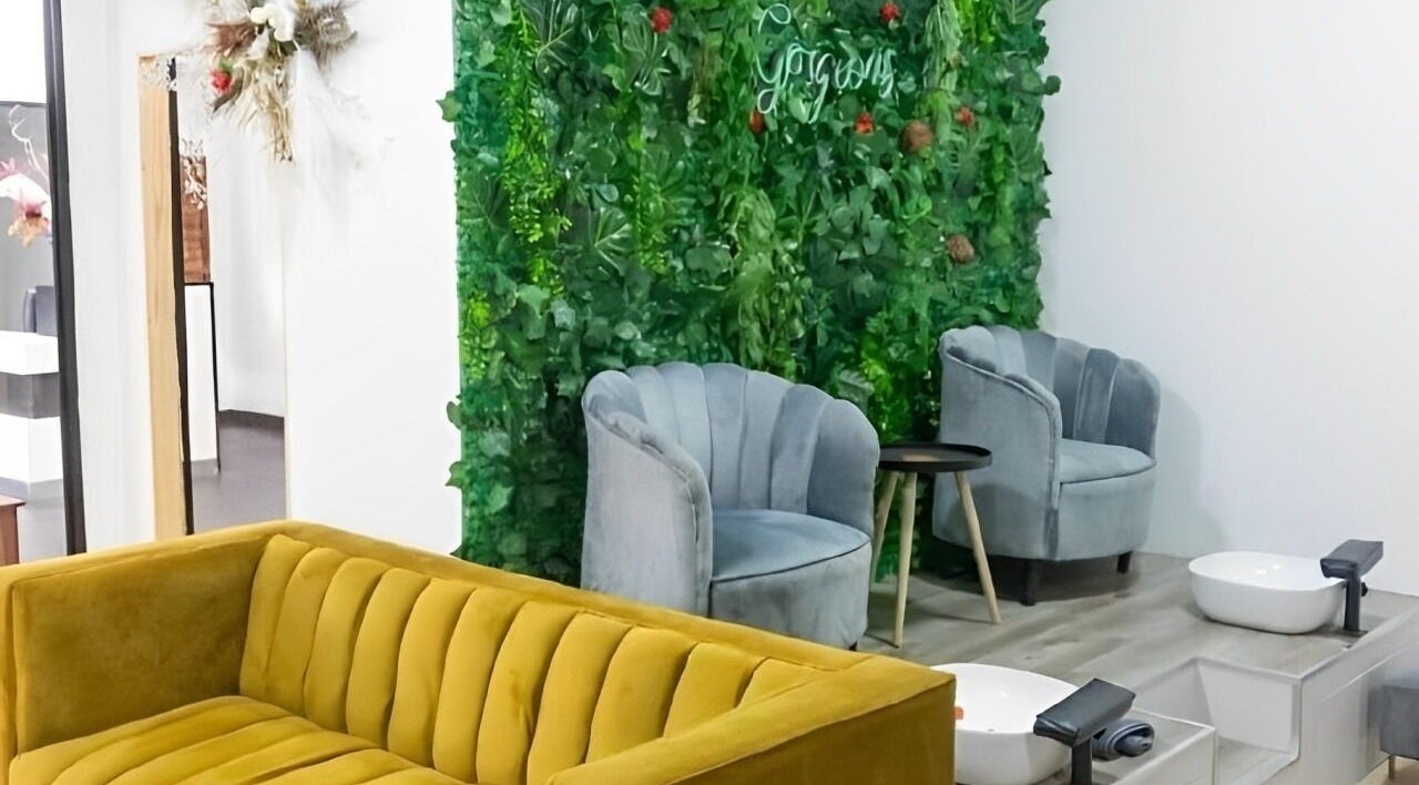 Chic seating at Sheek Hair | Somerset West, Cape Town, Western Cape, ZA for a relaxing salon experience.