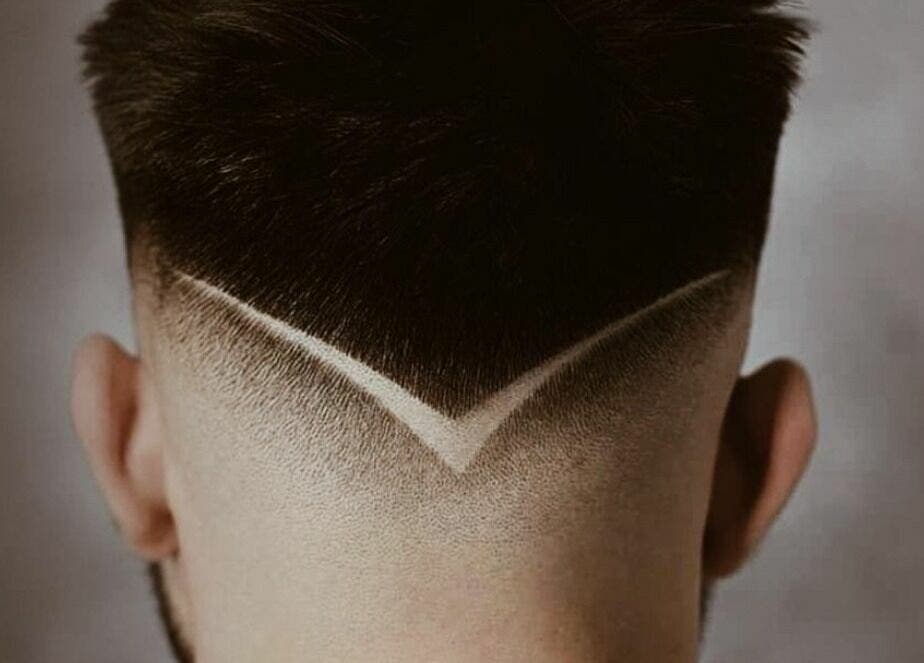 Sleek fade haircut at Touches Men Salon, Dubai, Dubai, AE.