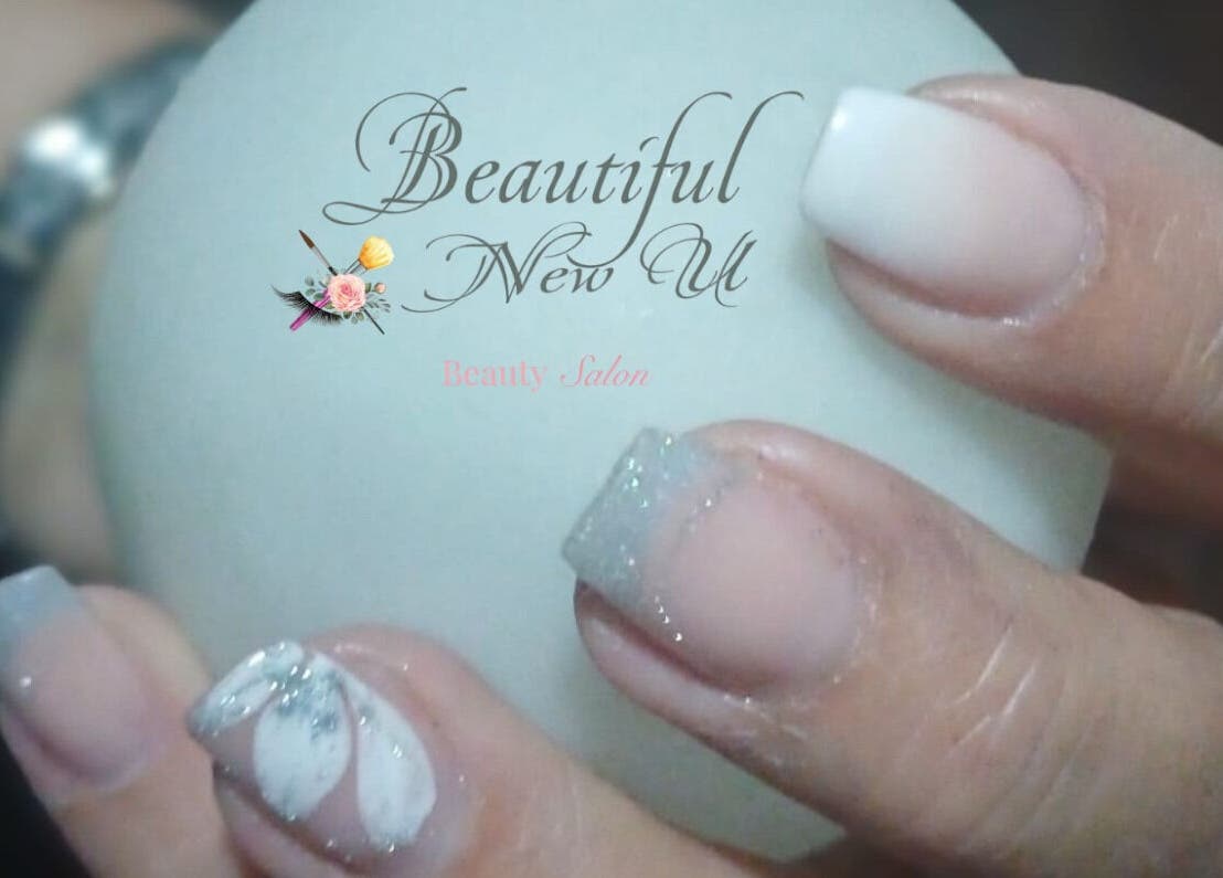 Elegant nail art at Beautiful New U, Boksburg, Gauteng, ZA, showcasing intricate designs and perfect manicure.
