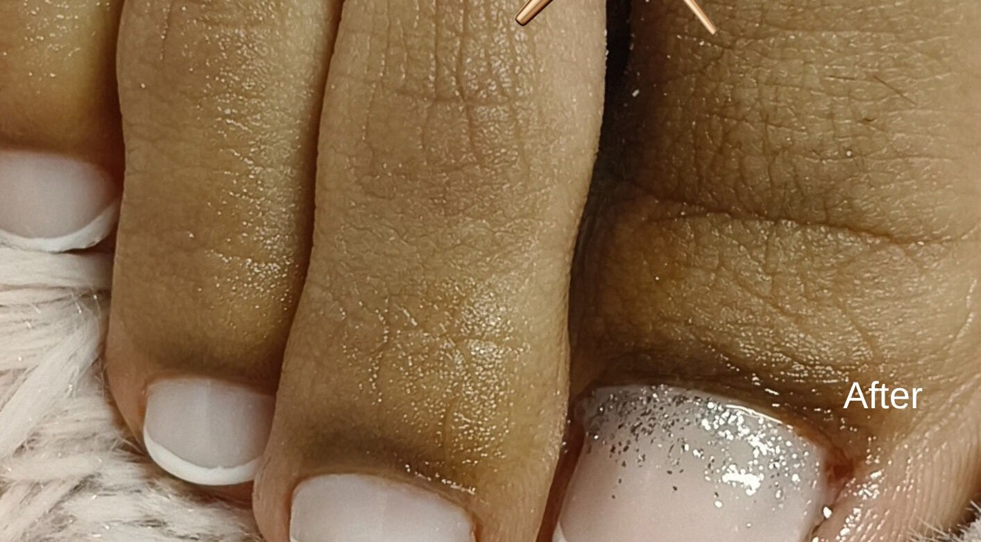 Glittering nail art pedicure at Beautiful New U, Boksburg, Gauteng, ZA. Close-up of toes with glitter polish.