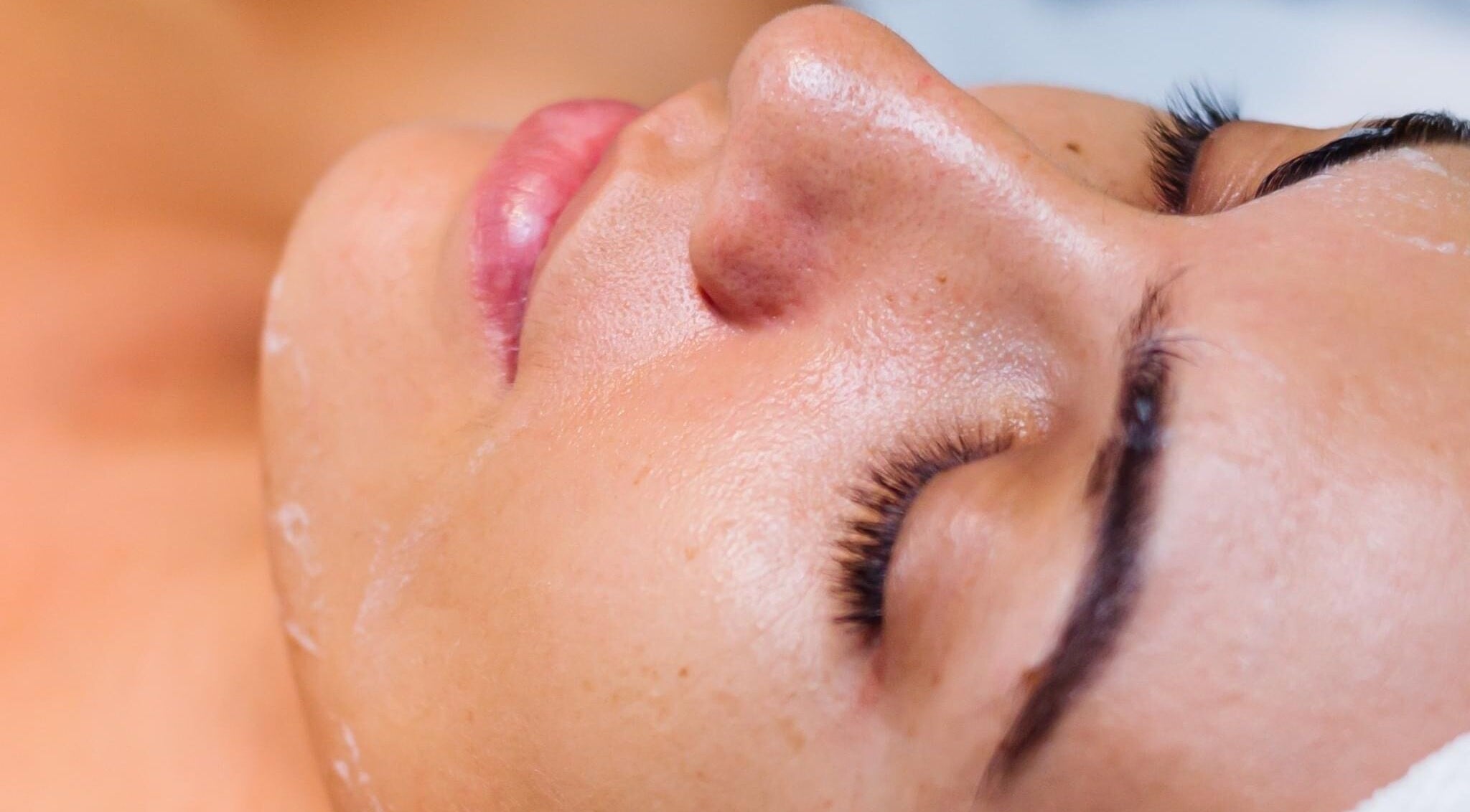 Relaxing facial treatment at Belle Ame Beauty and Nails, Millwater, Auckland, NZ promotes healthy skin glow.