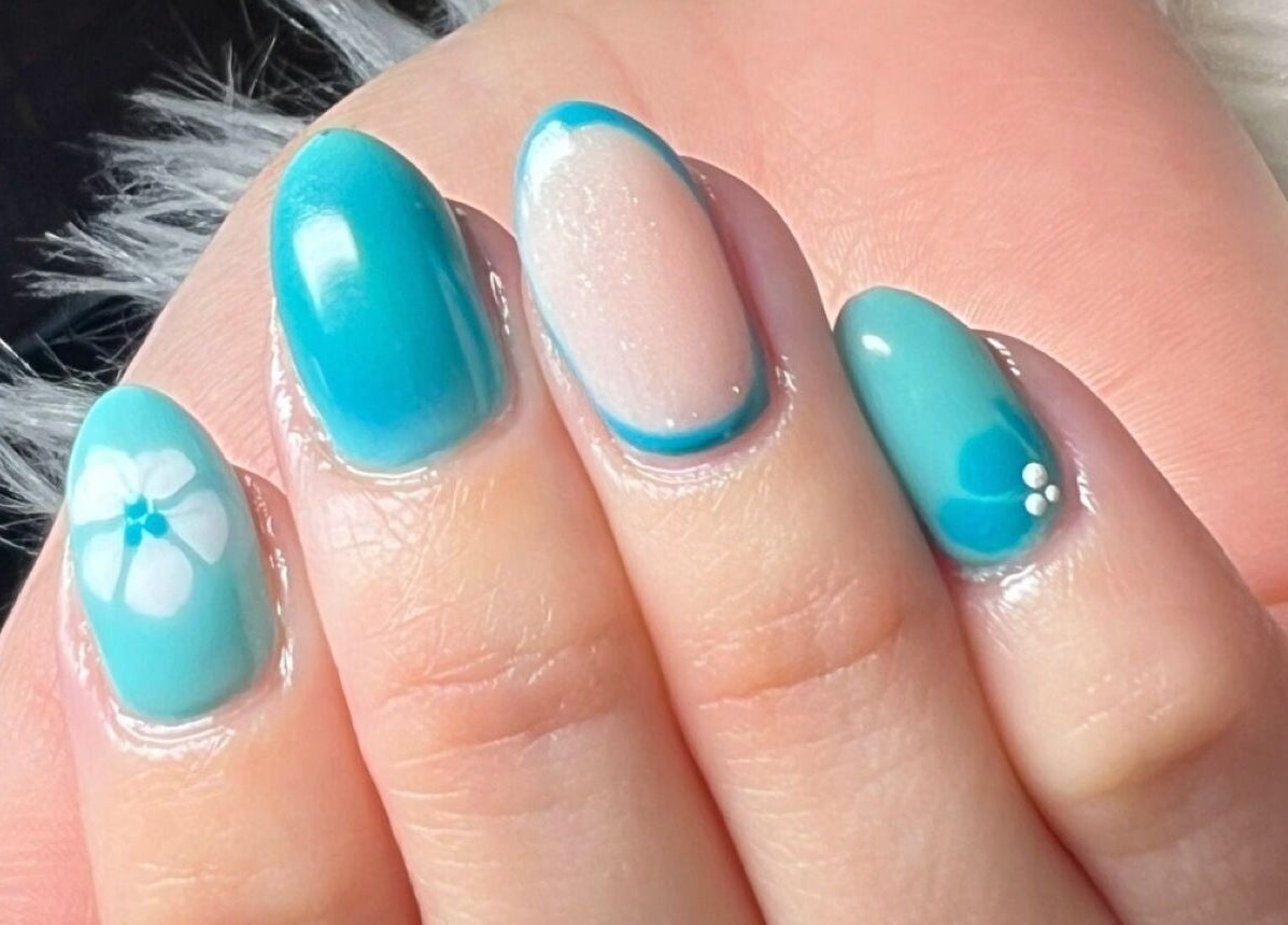 Aqua blue nail art with floral design at Belle Ame Beauty and Nails, Millwater, Auckland, NZ.