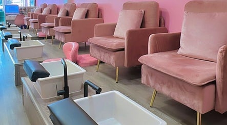 Luxe pedicure chairs at Politur Nails Beauty Lounge, Los Angeles, California, US. Comfort meets elegance.