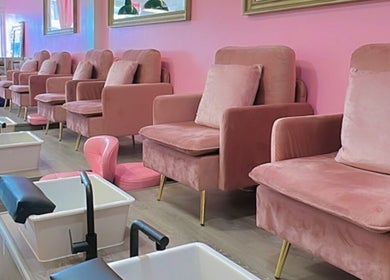 Politur Nails Beauty Lounge, luxury nail spa with plush pink chairs in Los Angeles, California, US.