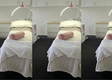 Relaxing treatment room at Hayley Maree's Beauty Howick in Auckland, Auckland, NZ, with a cozy bed setup.