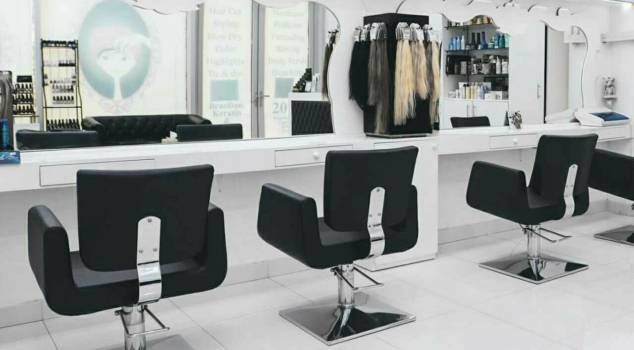 Modern styling chairs at La Parisienne Beauty Salon LLC, Dubai, Dubai, AE with high-end hair products.