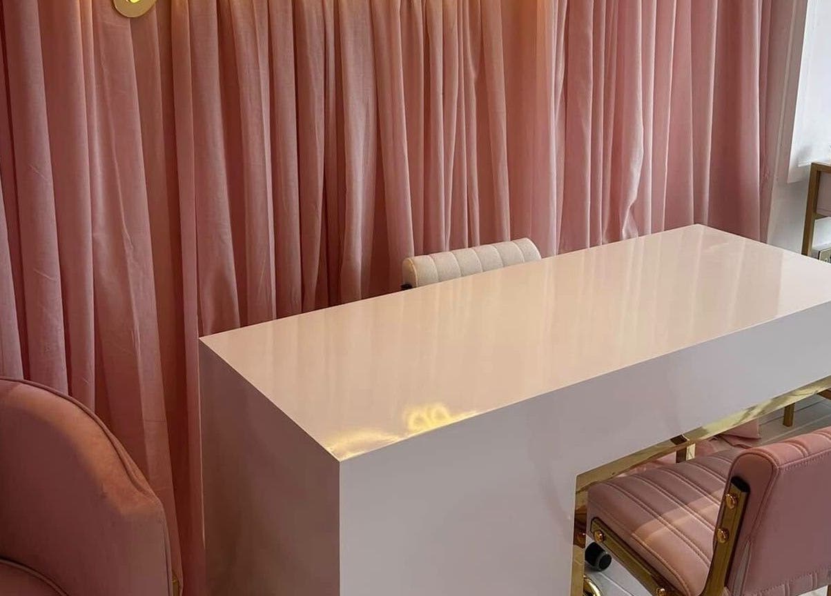 Luxurious pink salon interior at Ohh Beau, Gosport, England, GB with elegant furnishings.