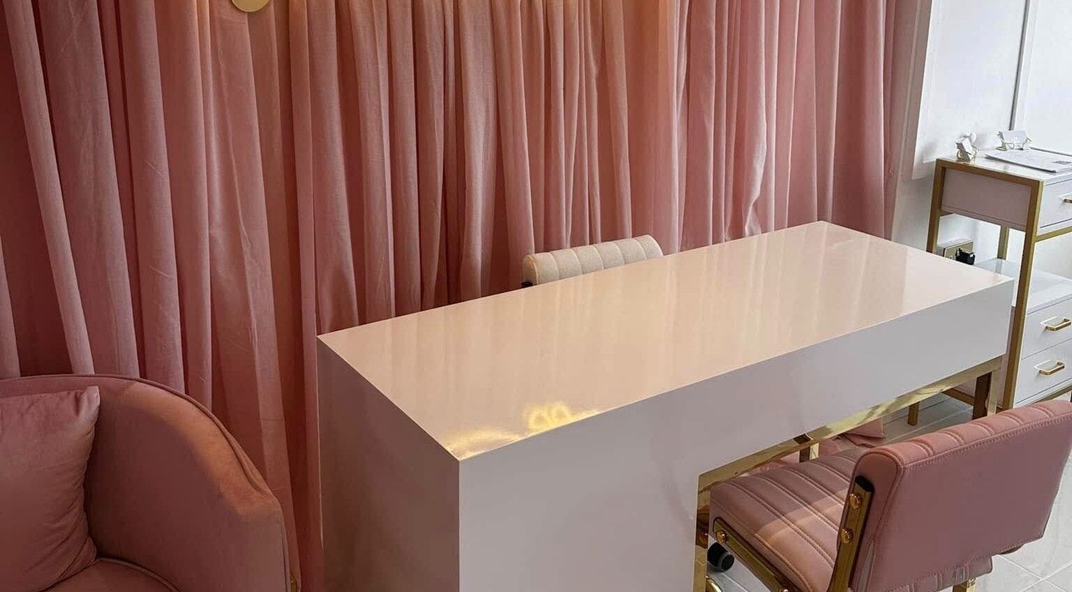 Luxurious pink salon interior at Ohh Beau, Gosport, England, GB with elegant furnishings.