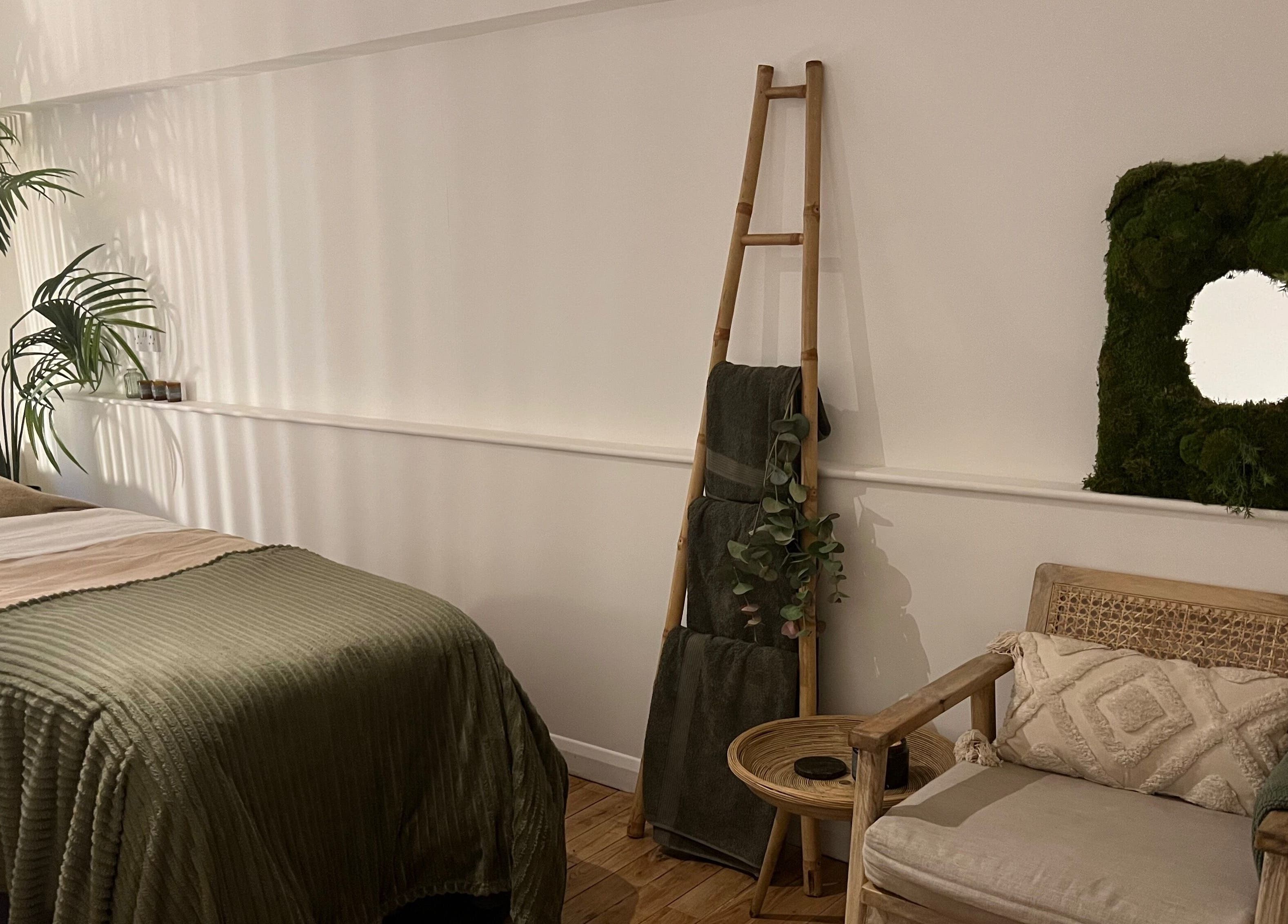 Relaxing treatment room at elixir, Royal Leamington Spa, England, GB with soothing decor and greenery.