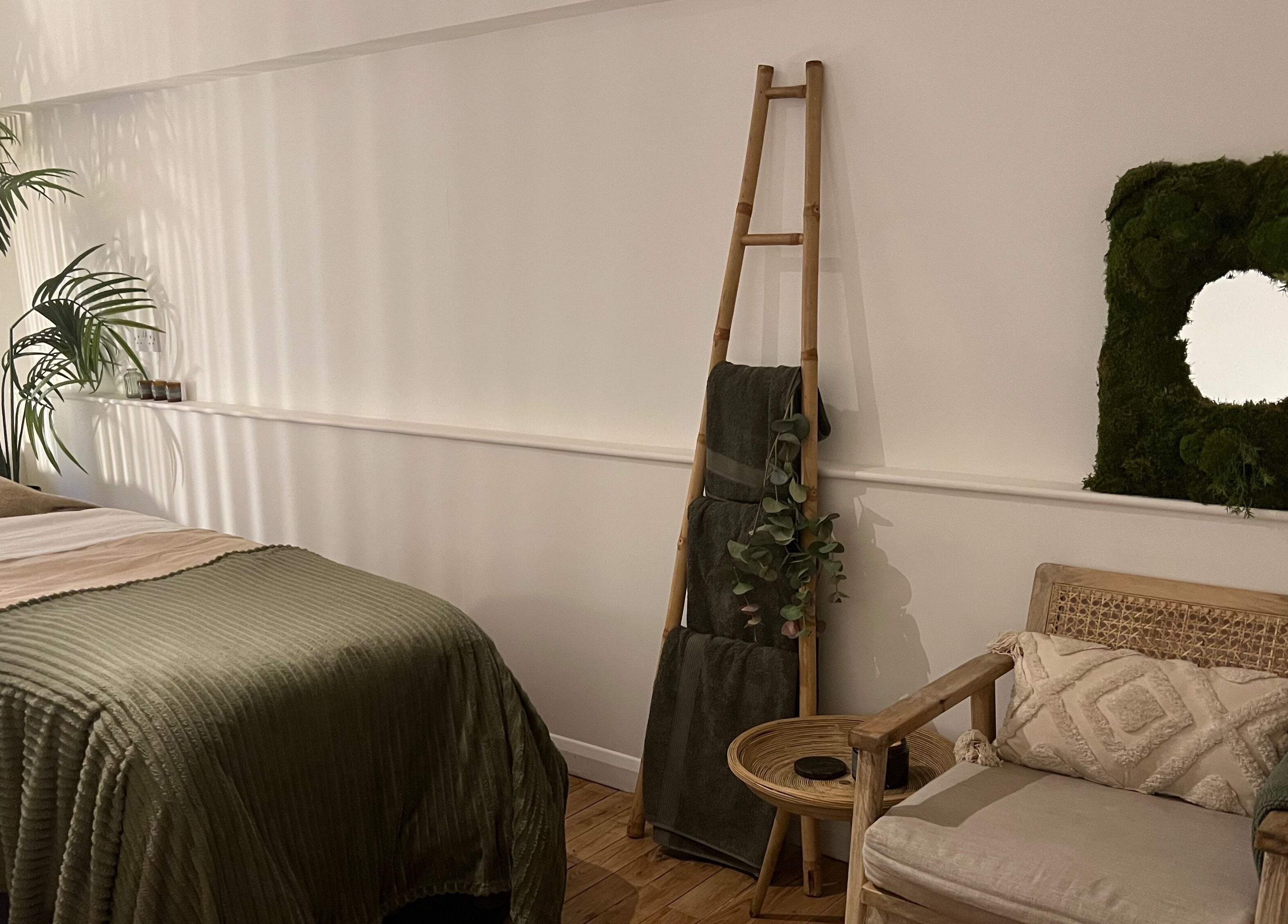 Relaxing treatment room at elixir, Royal Leamington Spa, England, GB with soothing decor and greenery.