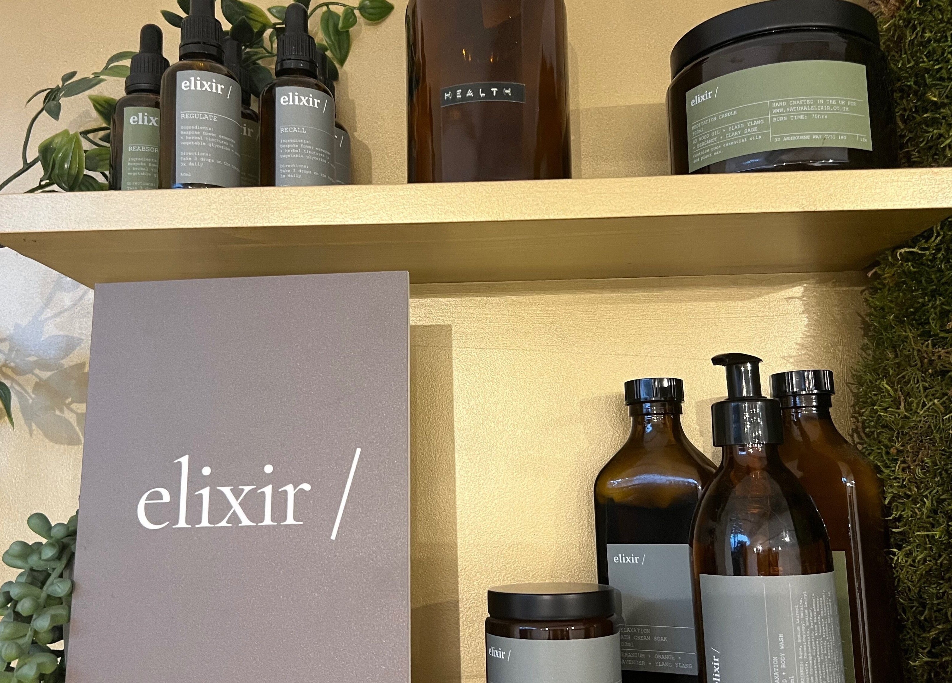 Elixir/ products neatly displayed on a shelf at Royal Leamington Spa, England, GB wellness venue.
