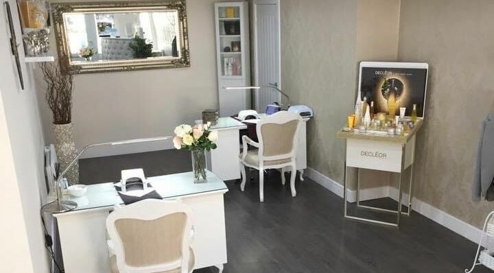 Flawless beauty salon interior with chic decor and product display in Shaw, England, GB.