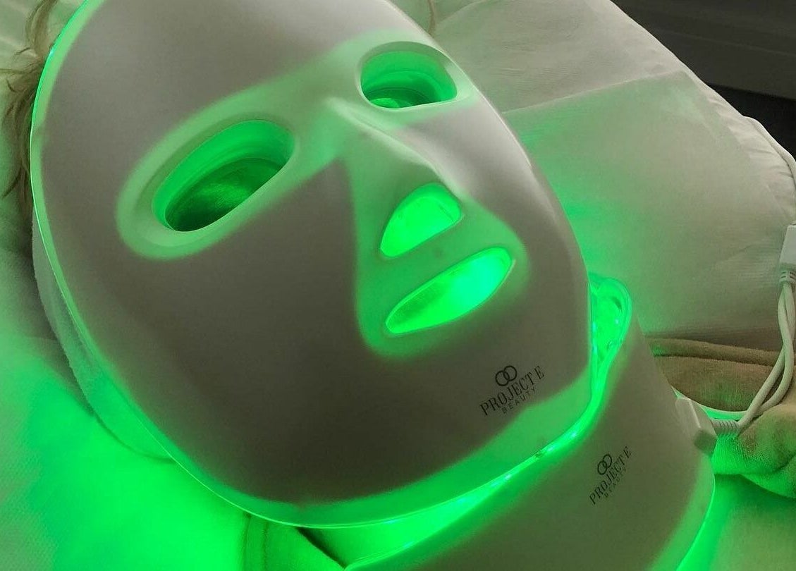 Customer enjoys LED facial at Flawless, Shaw, England, GB, the premier beauty and wellness venue.