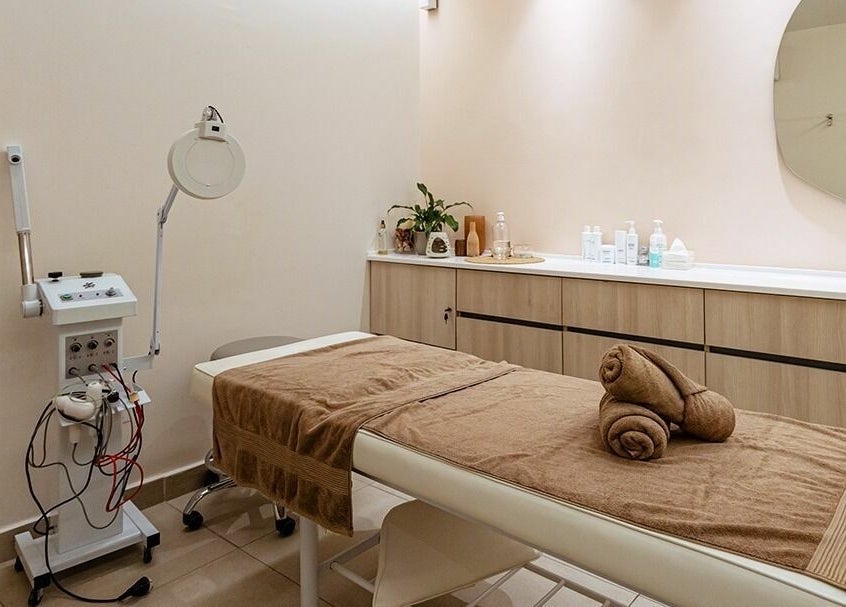 A tranquil spa room at Calamantina, Aqaba, Aqaba Governorate, JO with a massage table and soothing decor.