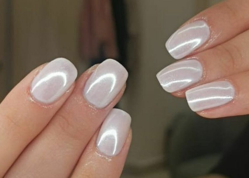 Elegant white nails at Calamantina, Aqaba, Aqaba Governorate, JO. Perfect nail art for a classy look.