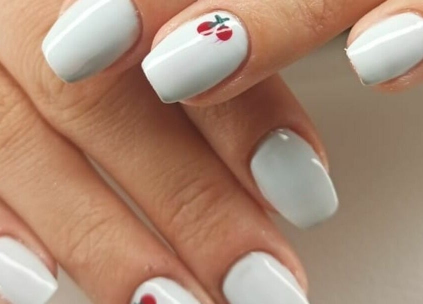 Close-up of chic nail art with white polish at Calamantina, Aqaba, Aqaba Governorate, JO.