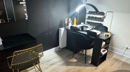 Modern nail station at By Ellie Rose in Brightons, Scotland, GB, featuring sleek design and ambient lighting.