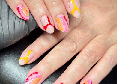 Colorful nail art design at By Ellie Rose in Brightons, Scotland, GB.