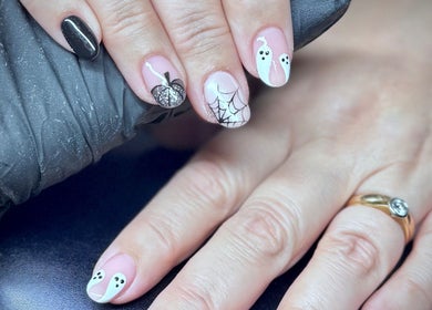 Halloween-themed nail art at By Ellie Rose in Brightons, Scotland, GB featuring ghosts and spiders.