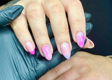 Close-up of vibrant pink nail art at By Ellie Rose in Brightons, Scotland, GB.