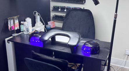 Nail station at By Ellie Rose, Brightons, Scotland with modern equipment and decor.