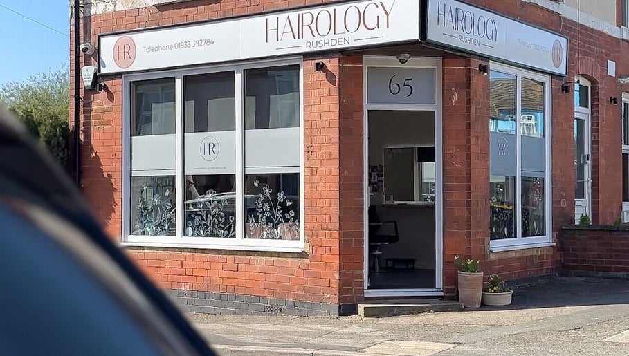 Front view of Hairology Rushden, located in Rushden, England, GB, showcasing its modern salon entrance.