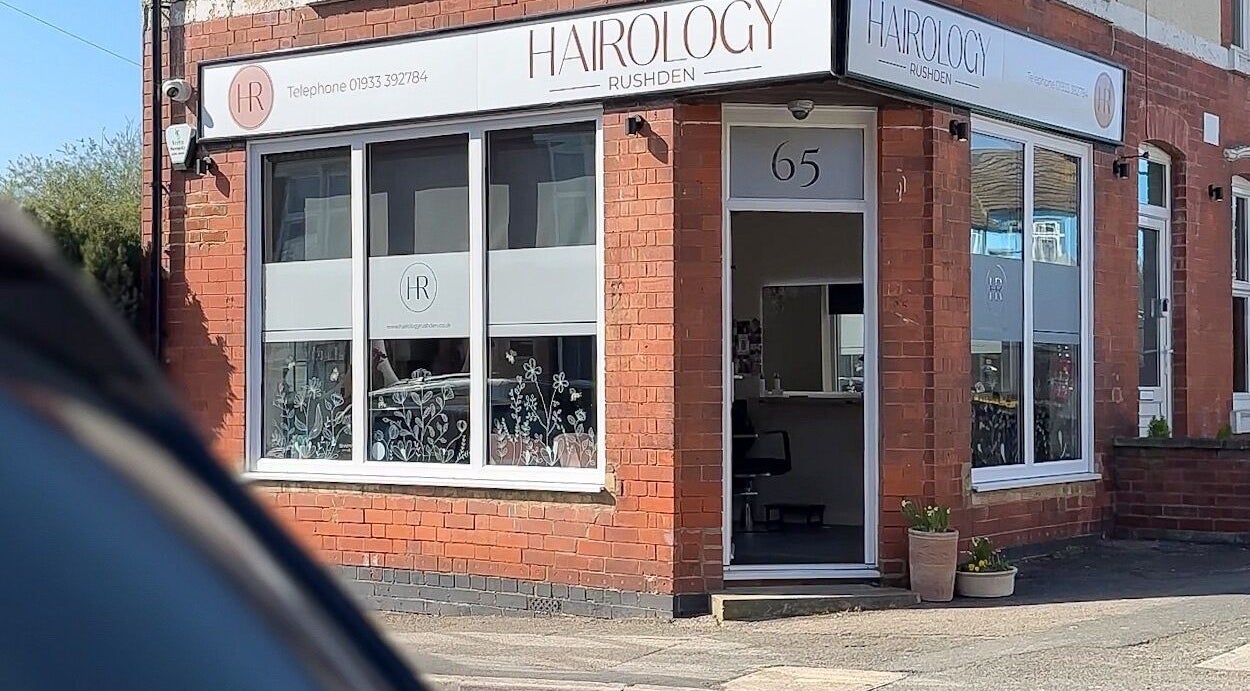 Front view of Hairology Rushden, located in Rushden, England, GB, showcasing its modern salon entrance.