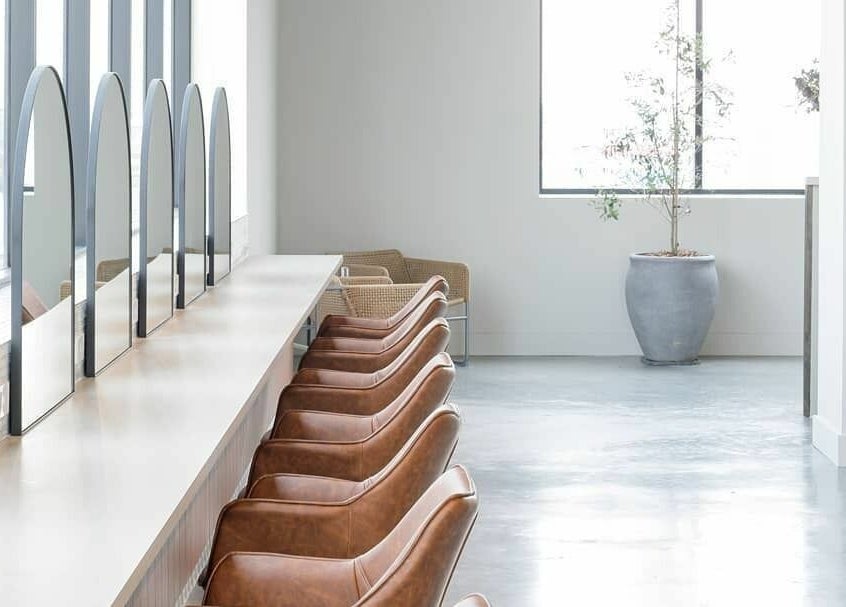 Chic salon chairs and mirrors at Unique Artist, Gledswood Hills, New South Wales, AU.