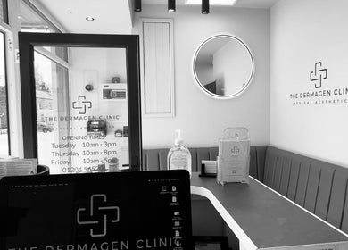 Modern reception area of The Dermagen Clinic Bolton, displaying logo and seating, located in Bolton, England, GB.