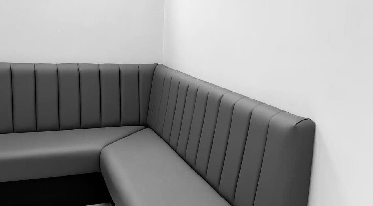 Elegant seating area at The Dermagen Clinic Weybridge in Weybridge, England, GB, creating a welcoming ambiance.