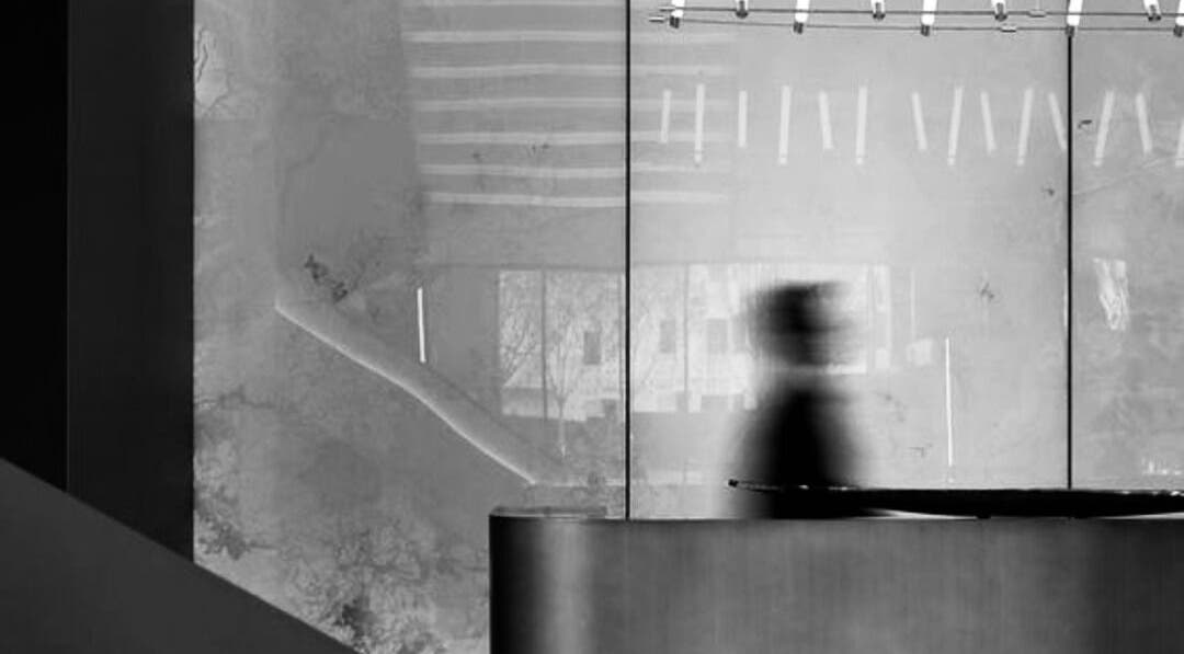 Modern interior at LDN, Weybridge, England, GB with blurred silhouette for a sleek, elegant vibe.