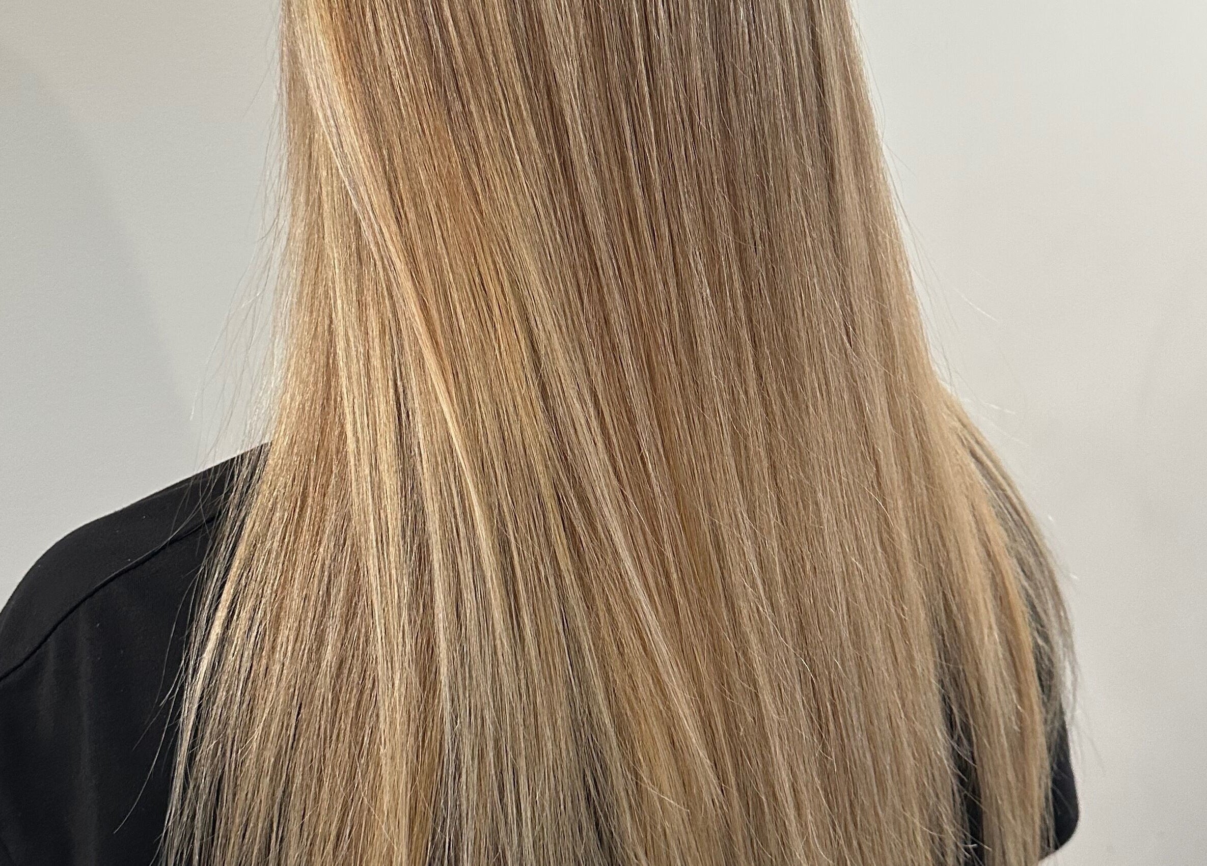 Blonde hair styled at Hill Hair and Makeup in Goderich, Ontario, CA showcasing expert hairstyling.