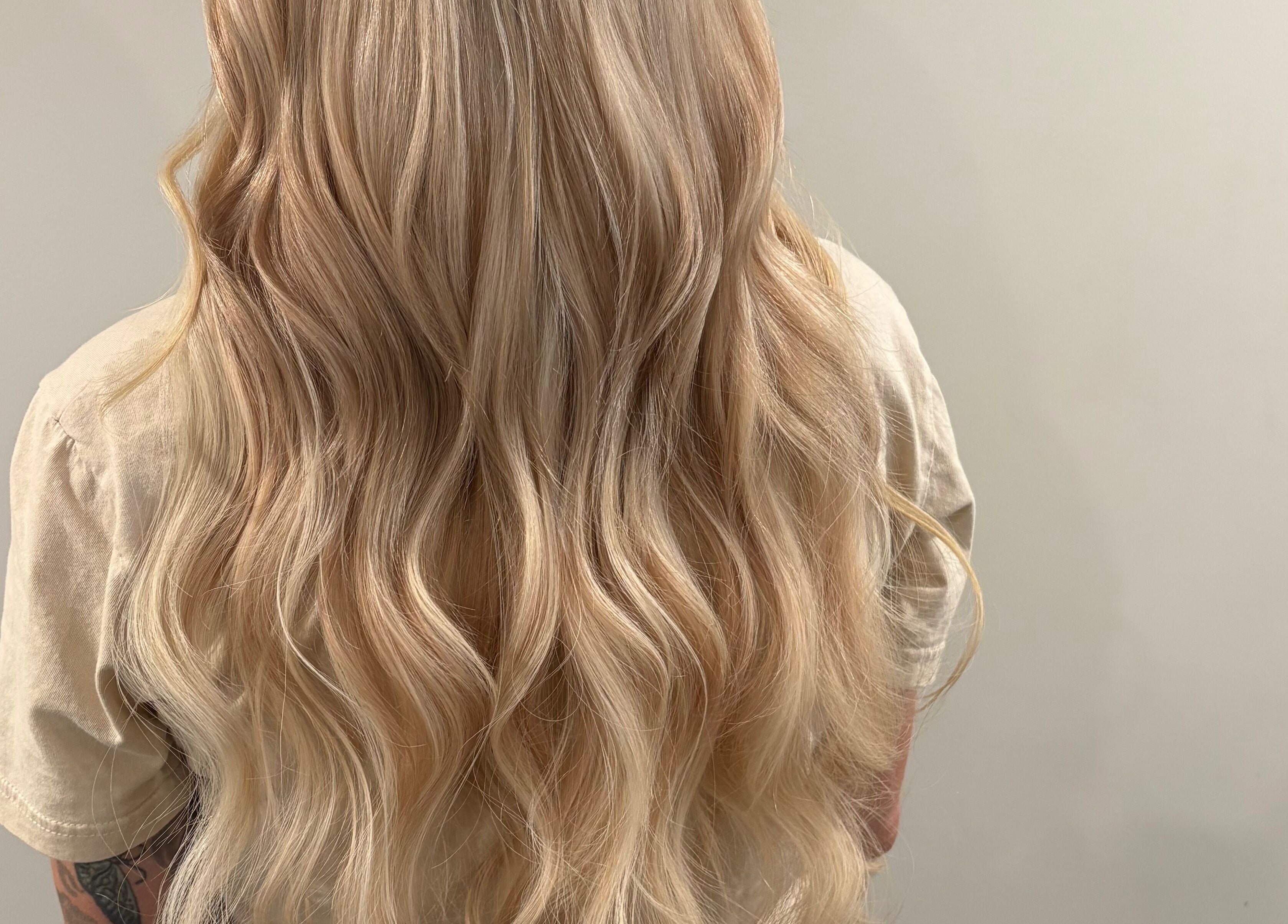 Elegant blonde waves styled at Hill Hair and Makeup, Goderich, Ontario, CA.
