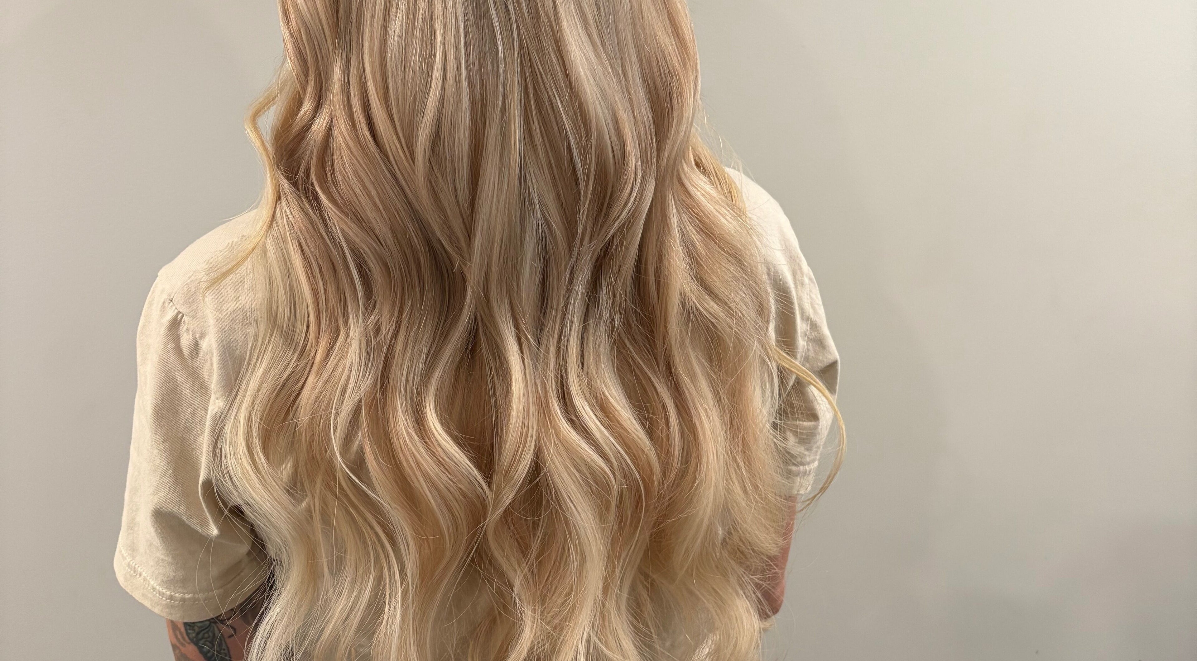Elegant blonde waves styled at Hill Hair and Makeup, Goderich, Ontario, CA.