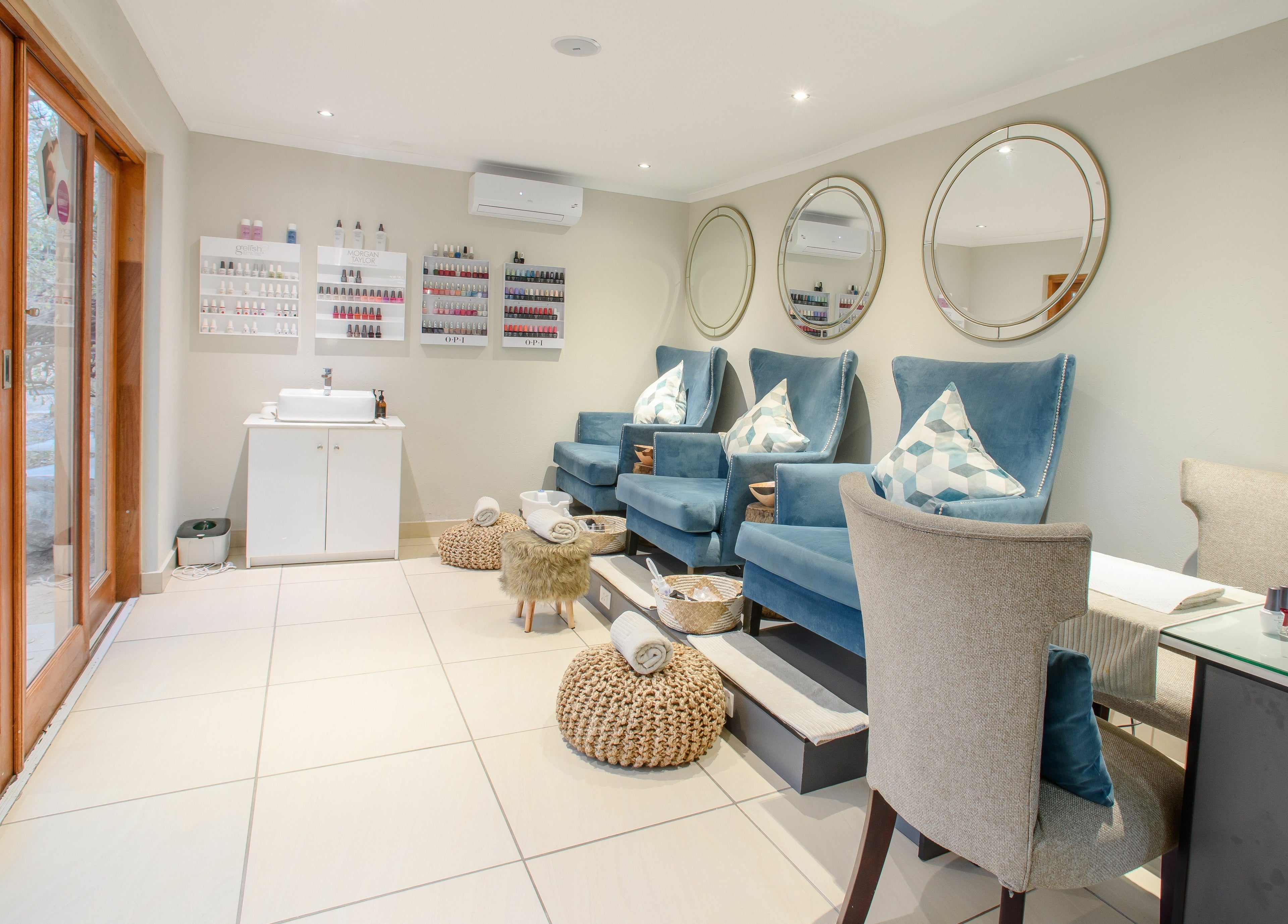 Luxurious pedicure chairs at AM Spa Kruger in Skukuza, Mpumalanga, ZA, offering a serene wellness experience.