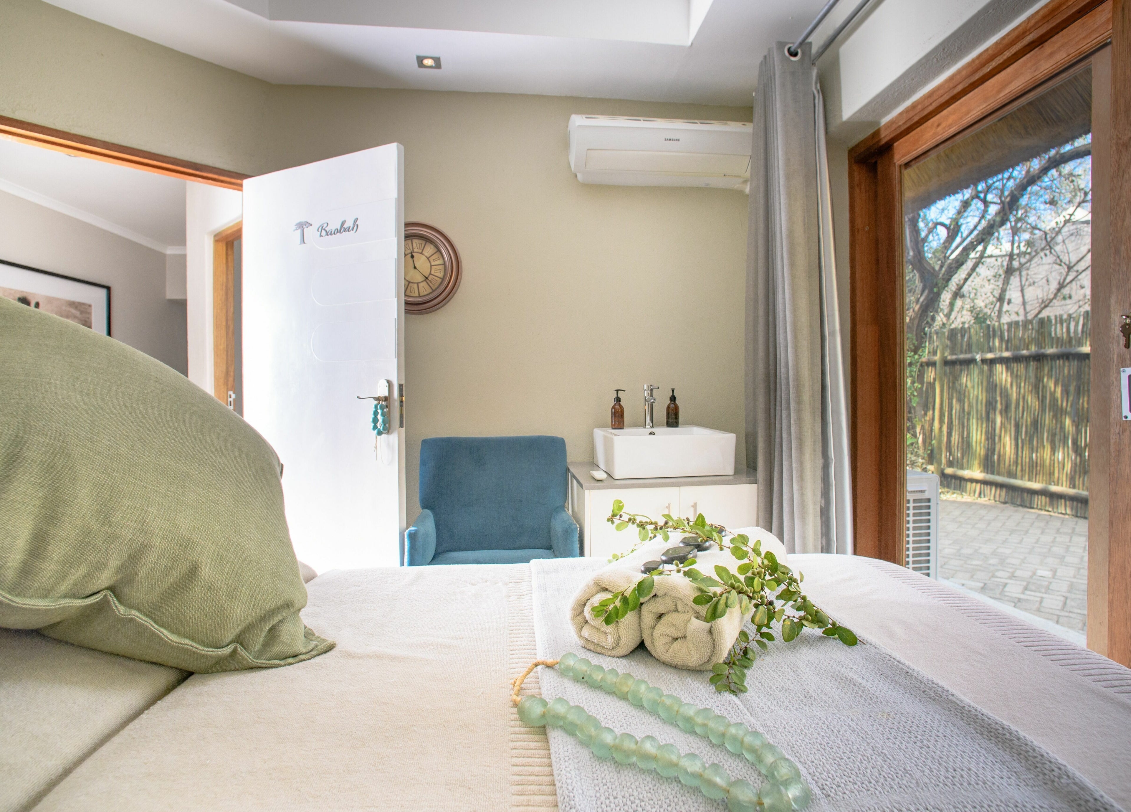 Elegant spa treatment room at AM Spa Kruger in Skukuza, Mpumalanga, ZA with tranquil ambiance.