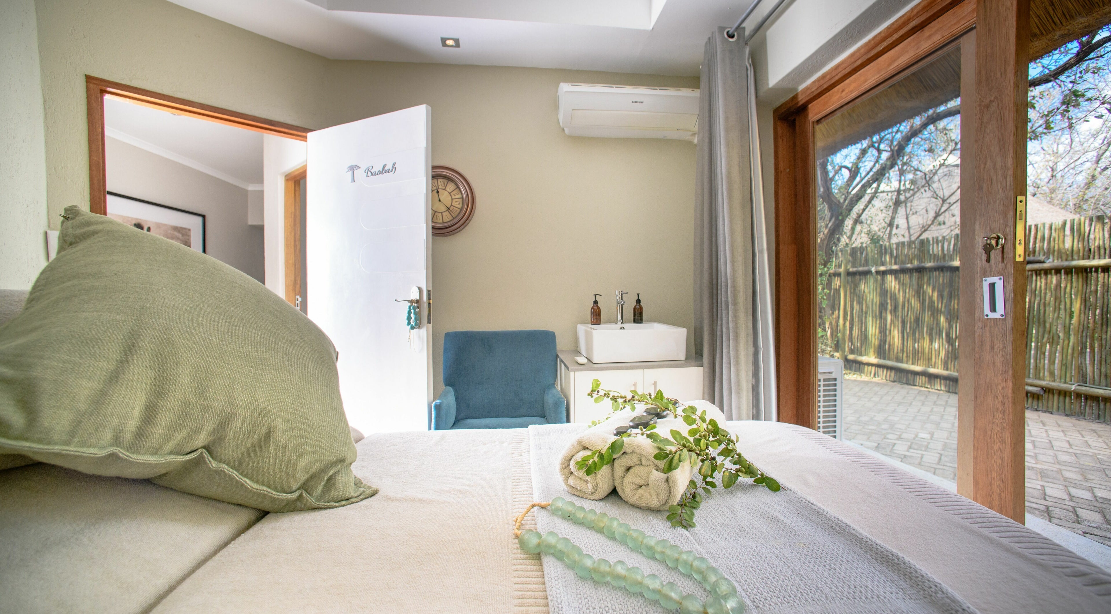 Elegant spa treatment room at AM Spa Kruger in Skukuza, Mpumalanga, ZA with tranquil ambiance.