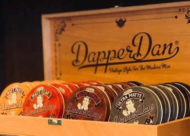 Variety of Dapper Dan products on display at Ak Barbershop (Mina Alarab), Al Jazirah Al Hamra, Ras al Khaimah, AE.