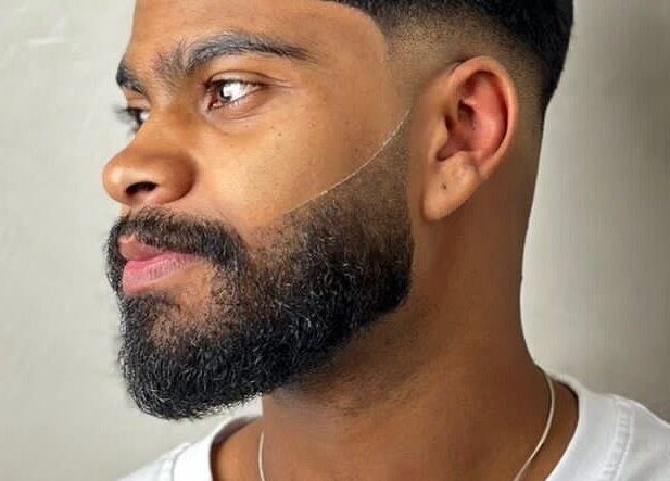 Neatly trimmed beard at Fade in Muscat, bosher, OM showcasing expert grooming skills.