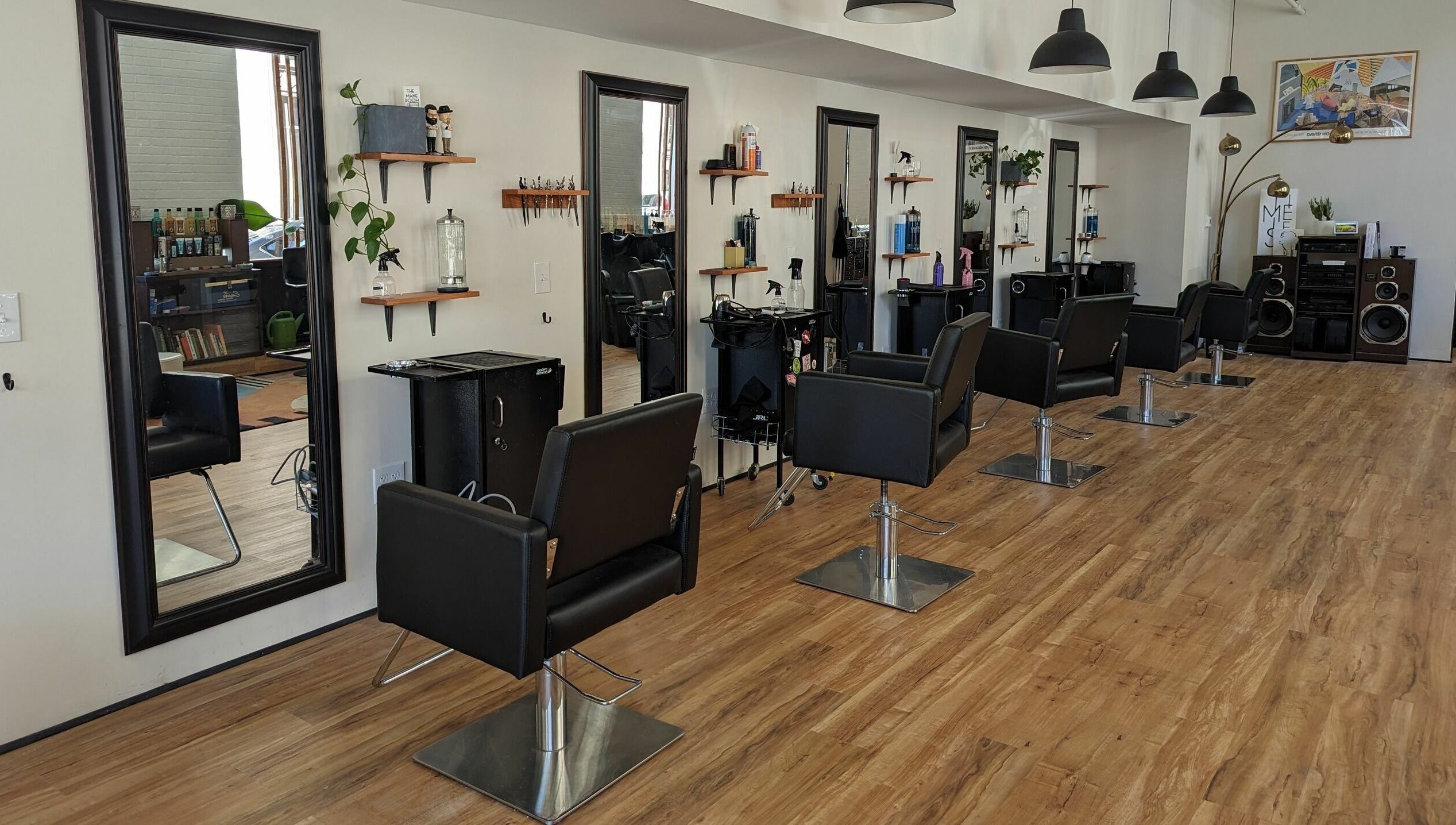 The Mane Room salon interior showcasing stylish chairs and mirrors in Scranton, Pennsylvania, US.
