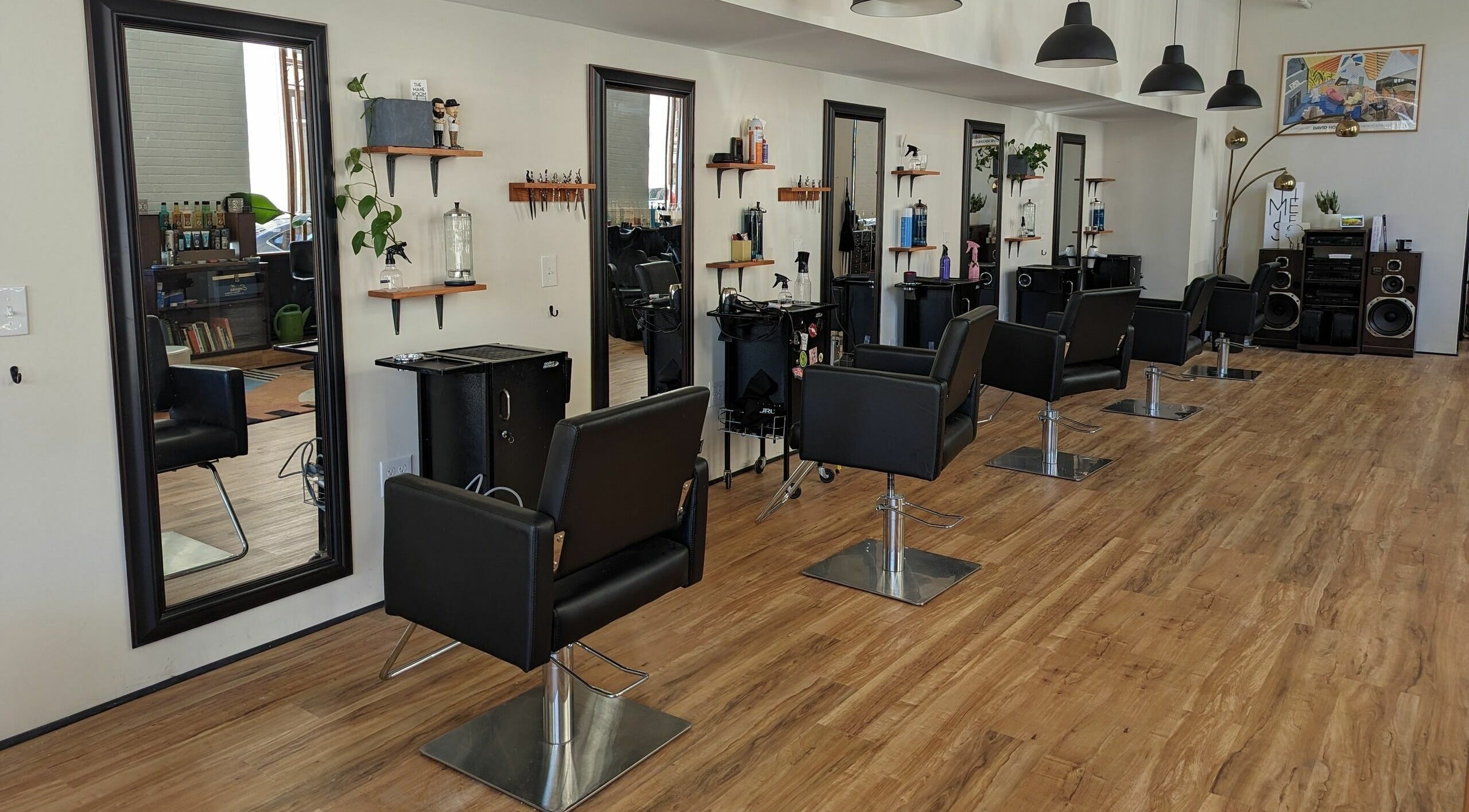 The Mane Room salon interior showcasing stylish chairs and mirrors in Scranton, Pennsylvania, US.