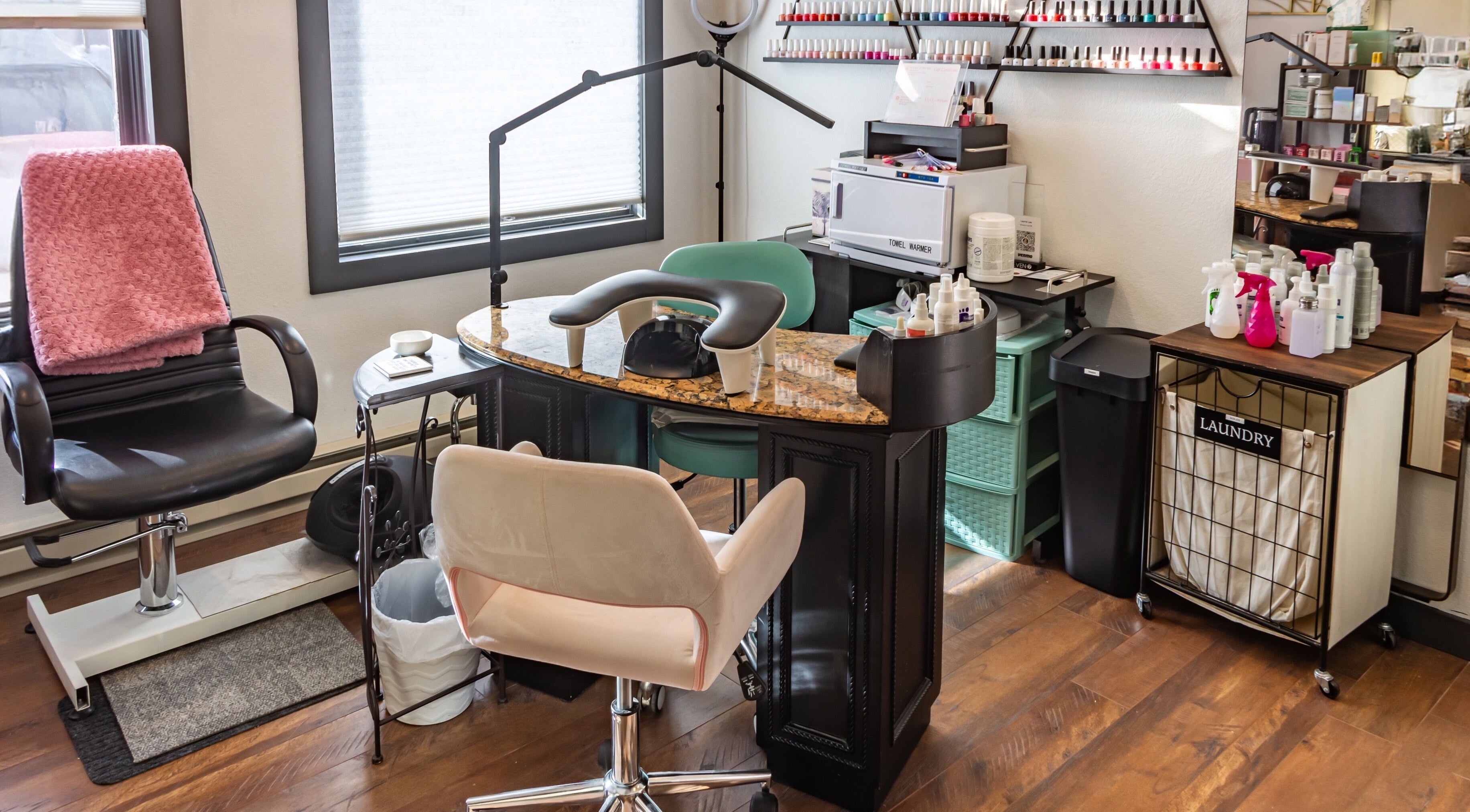 Nail care station at Double O Day Spa, Big Sky, Montana, US, featuring a polished setup for personalized treatments.