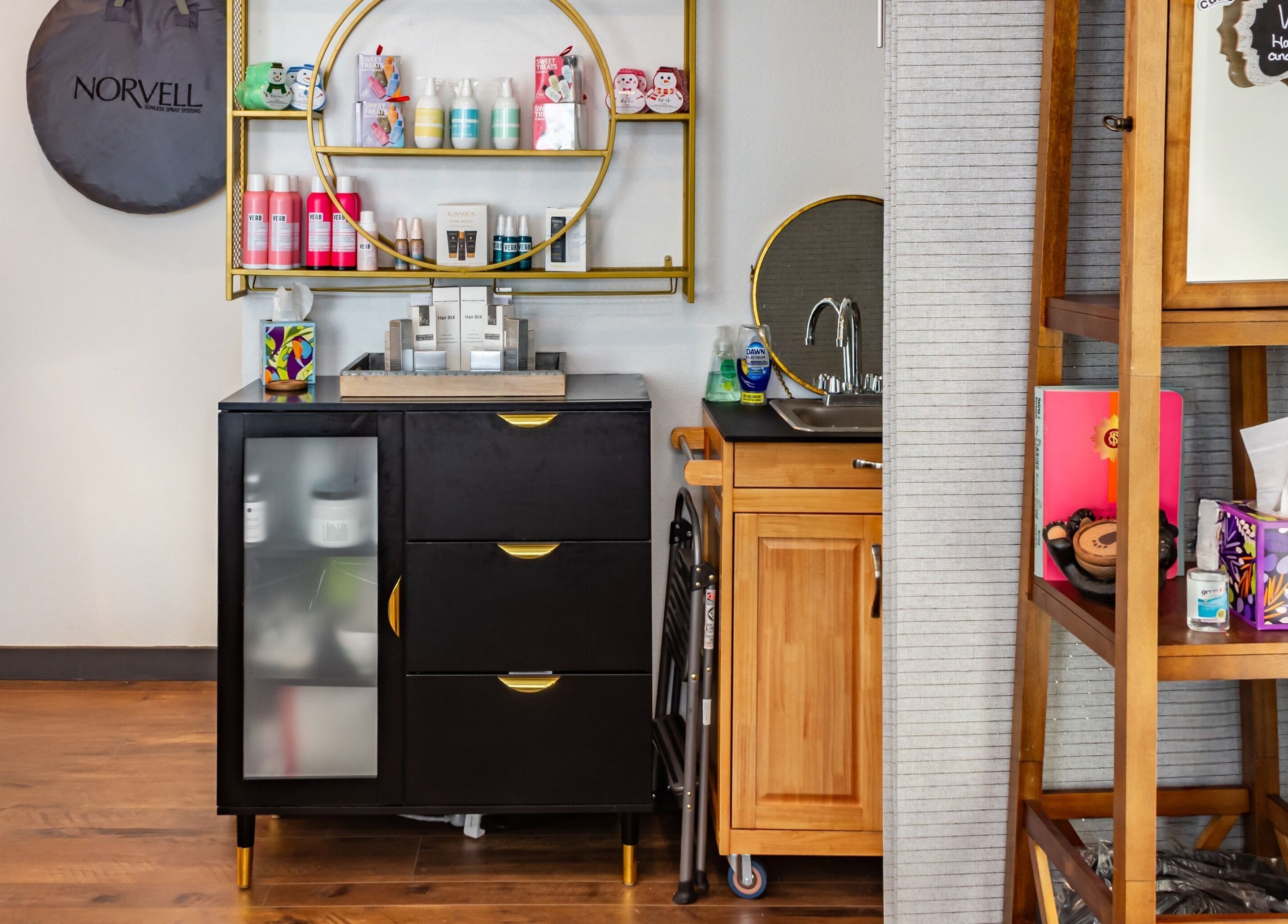 Relaxing spa shelf at Double O Day Spa, Big Sky, Montana, US, showcasing products and sink.