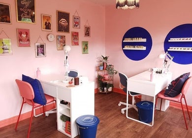 Chic nail salon interior at The Painted Parlour in Holmfirth, England, GB with stylish decor and manicure stations.